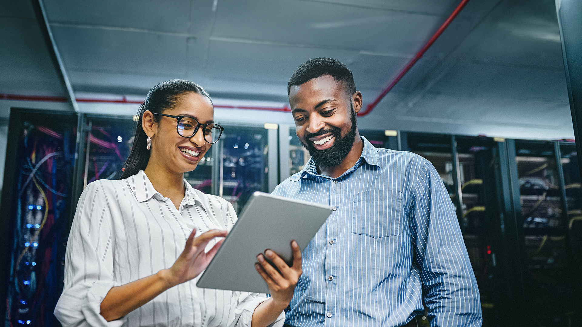 An IT professional discussing why CIOs are choosing Managed IT for strategic freedom with her IT Manager